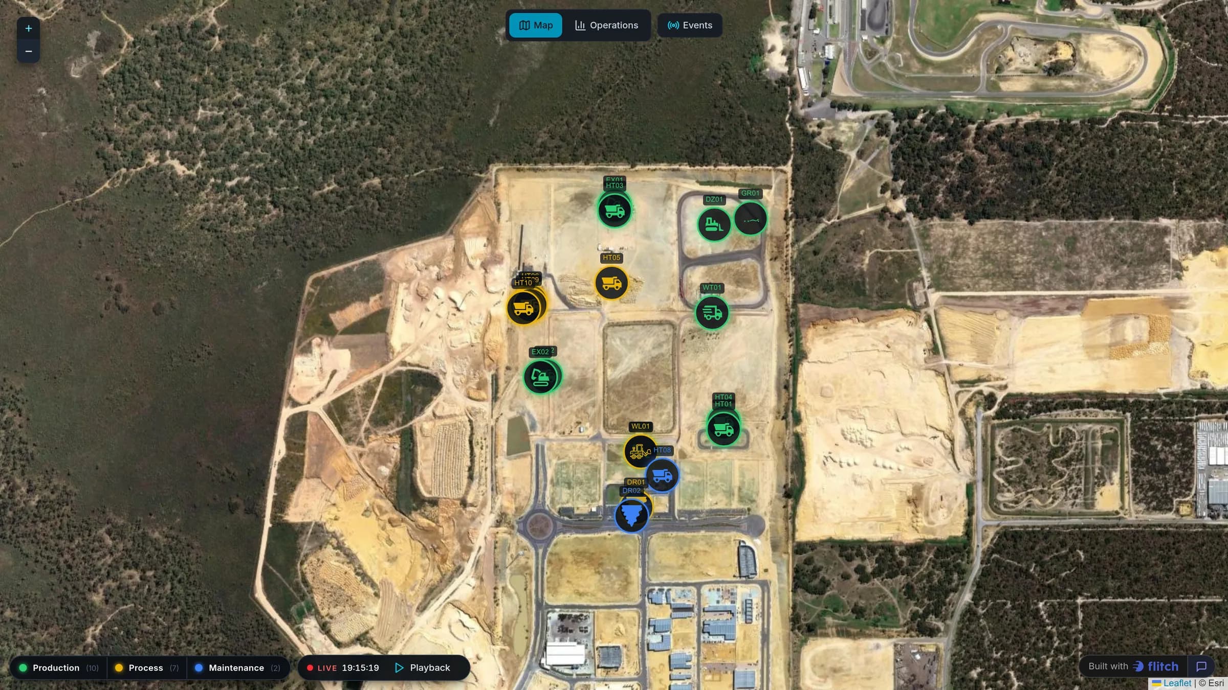 Satellite map of an open-pit mine with haul trucks, excavators and drills marked and colored by status, above a playback bar and a status legend